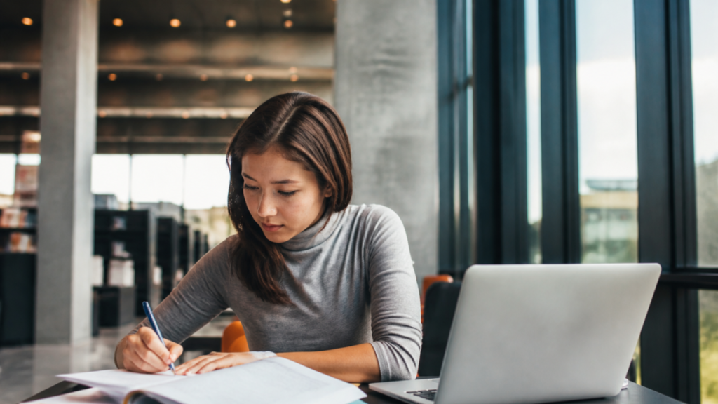 Person comparing college, certificate, apprenticeship, and job-training pathways for a U.S. career